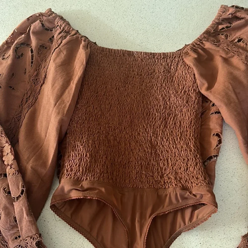 NWOT Free People Regina Bodysuit Top Thong Eyelet Balloon Sleeves Smocked Retro